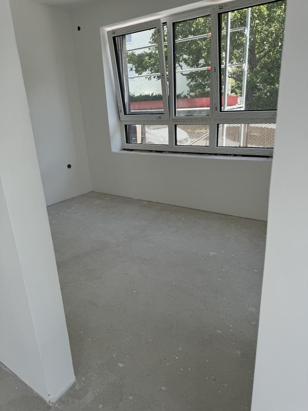 Eladó új építésű társasházi lakás - Kép 9