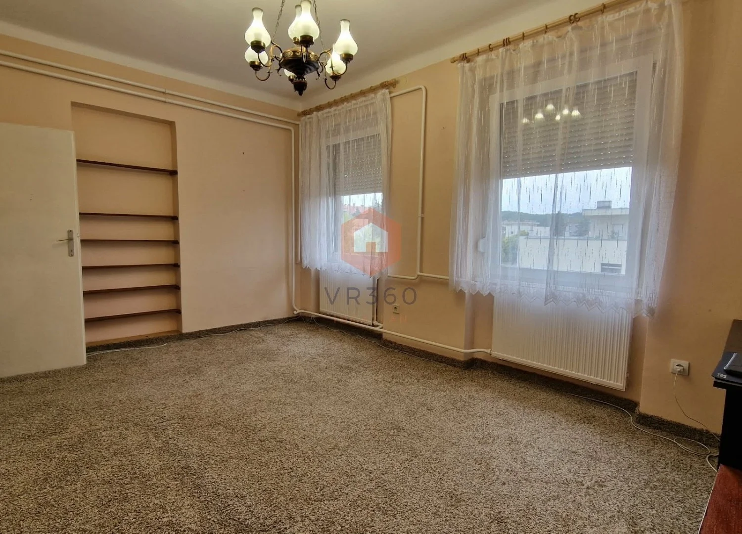 Eladó tégla lakás Komló Petőfi tér